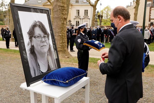 French PM pays tribute to slain police worker